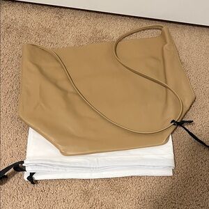 New Modern Weaving Single Strap Tall Crossbody
Camel